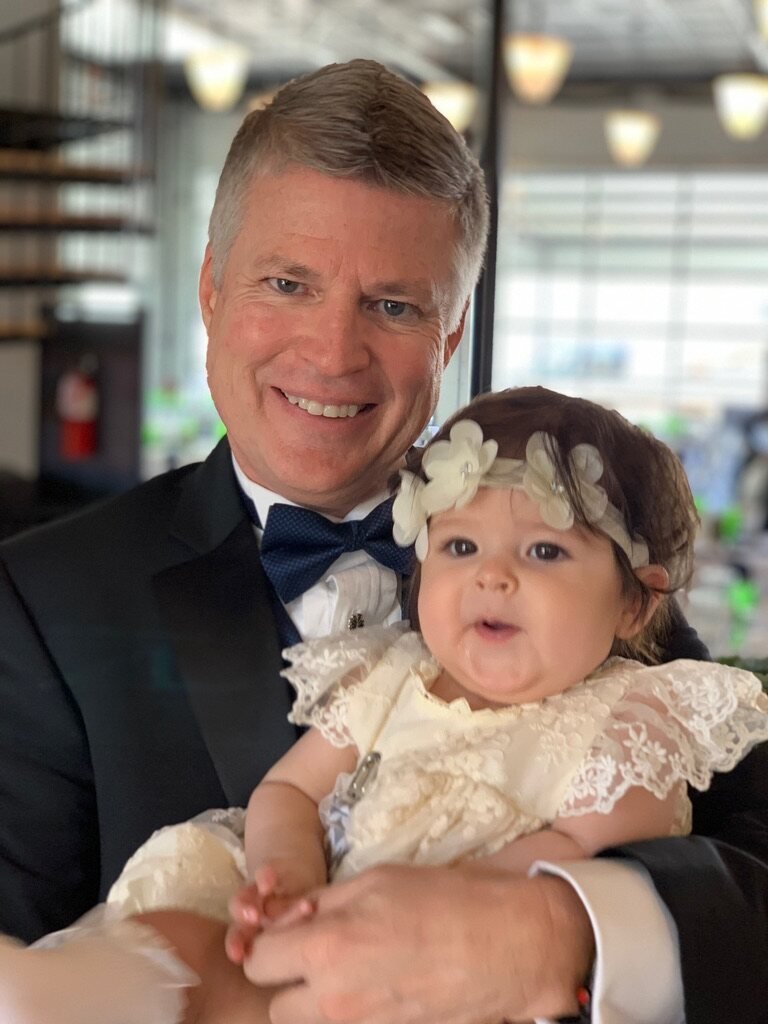Mark with his granddaughter